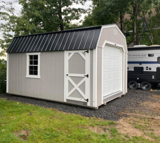 Flint barn with white trim sheds for sale near me
